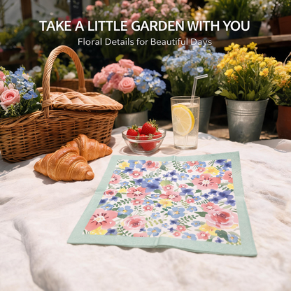 Watercolor floral napkins styled on a spring table